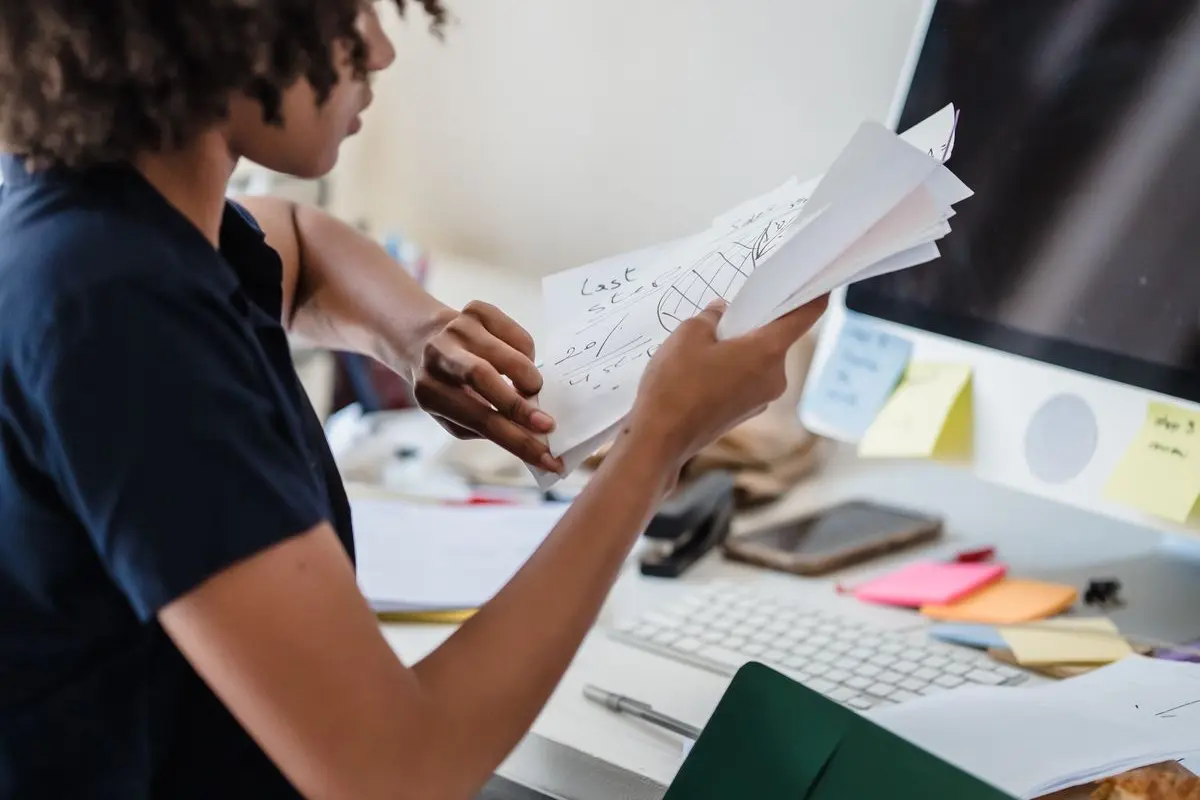 An office colleague examining documents