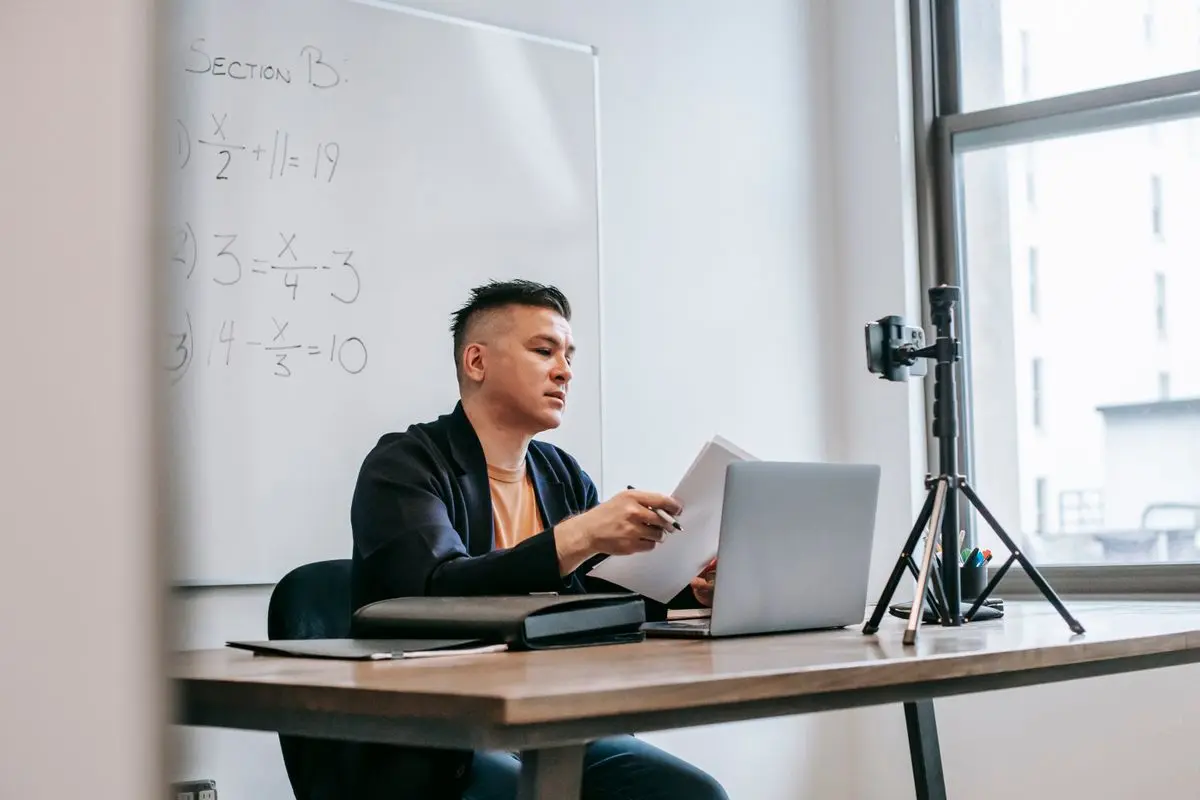 A teacher preparing an online lesson
