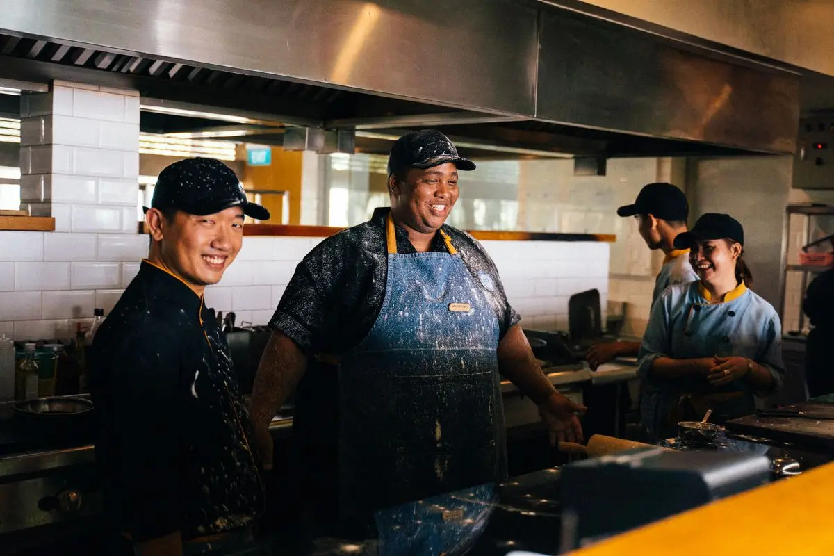 Staff working in a restaurant kitchen