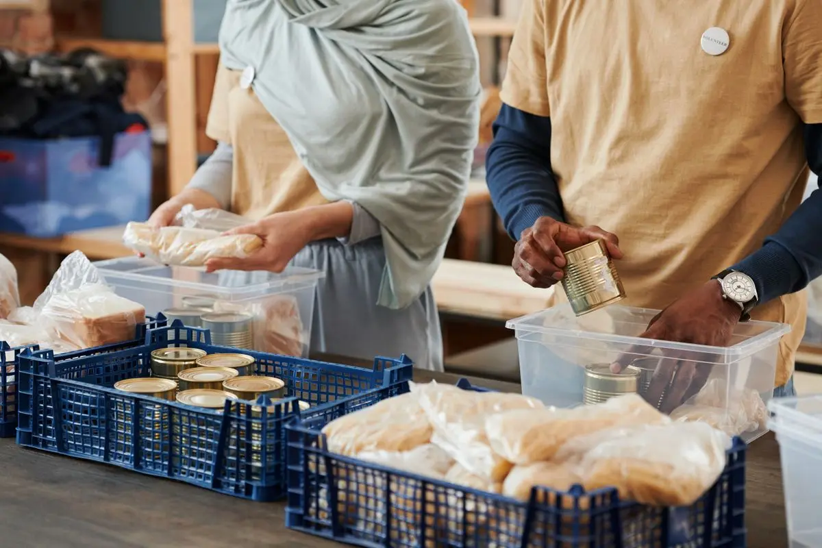 A group preparing donated goods
