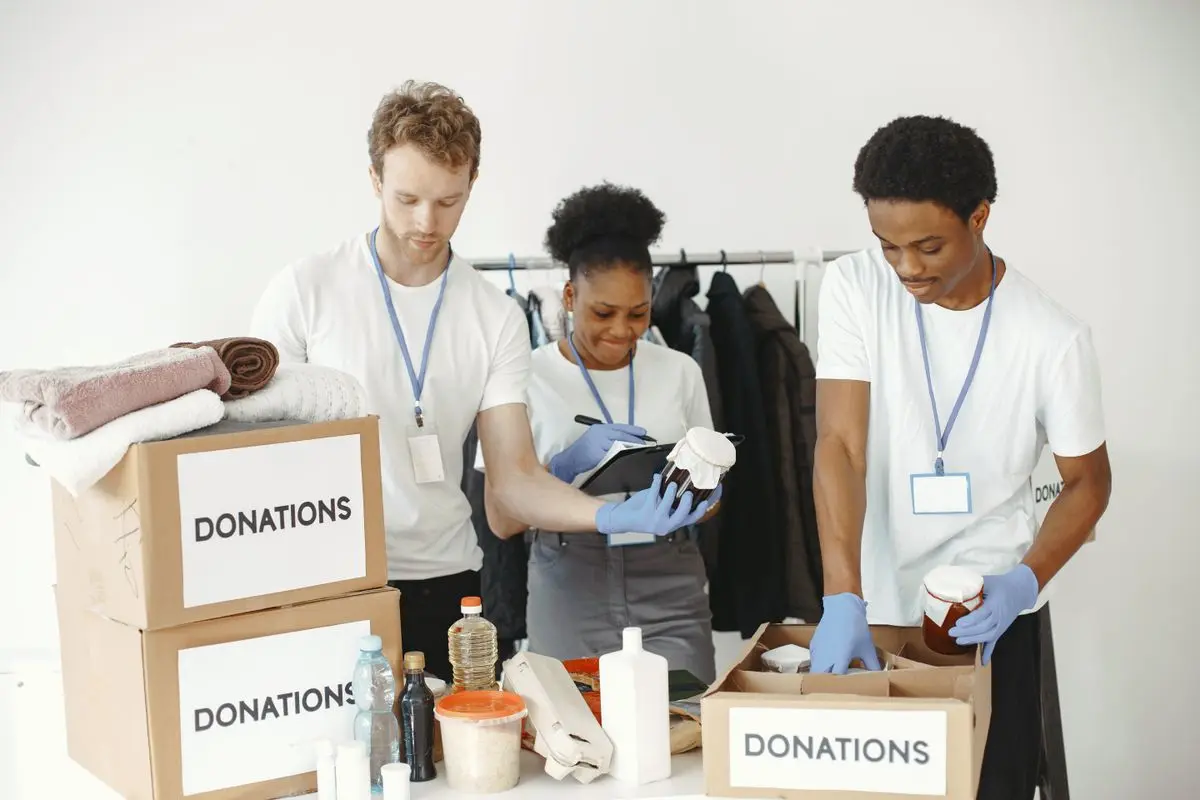 Volunteers packing donated supplies
